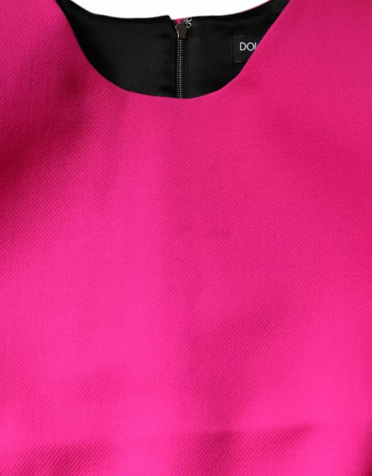 Pink sleeveless bodycon dress with zippered front