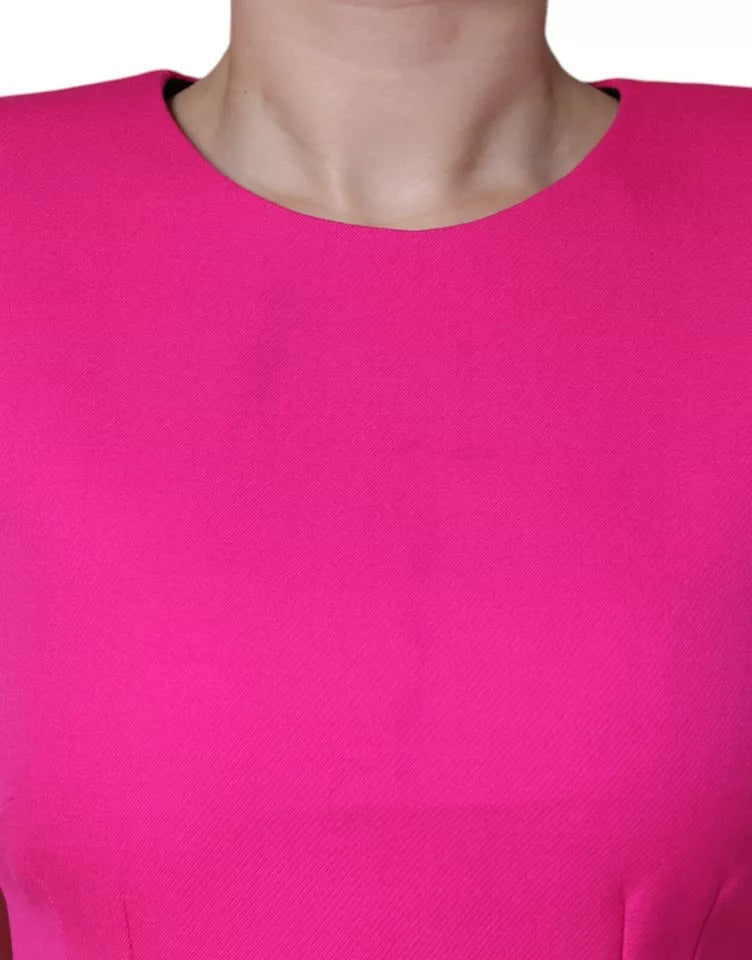 Pink sleeveless bodycon dress with A-line silhouette