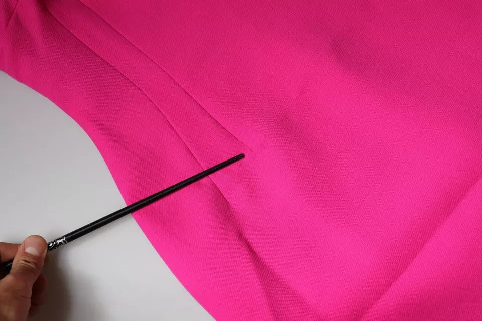 Pink sleeveless bodycon dress with A-line silhouette