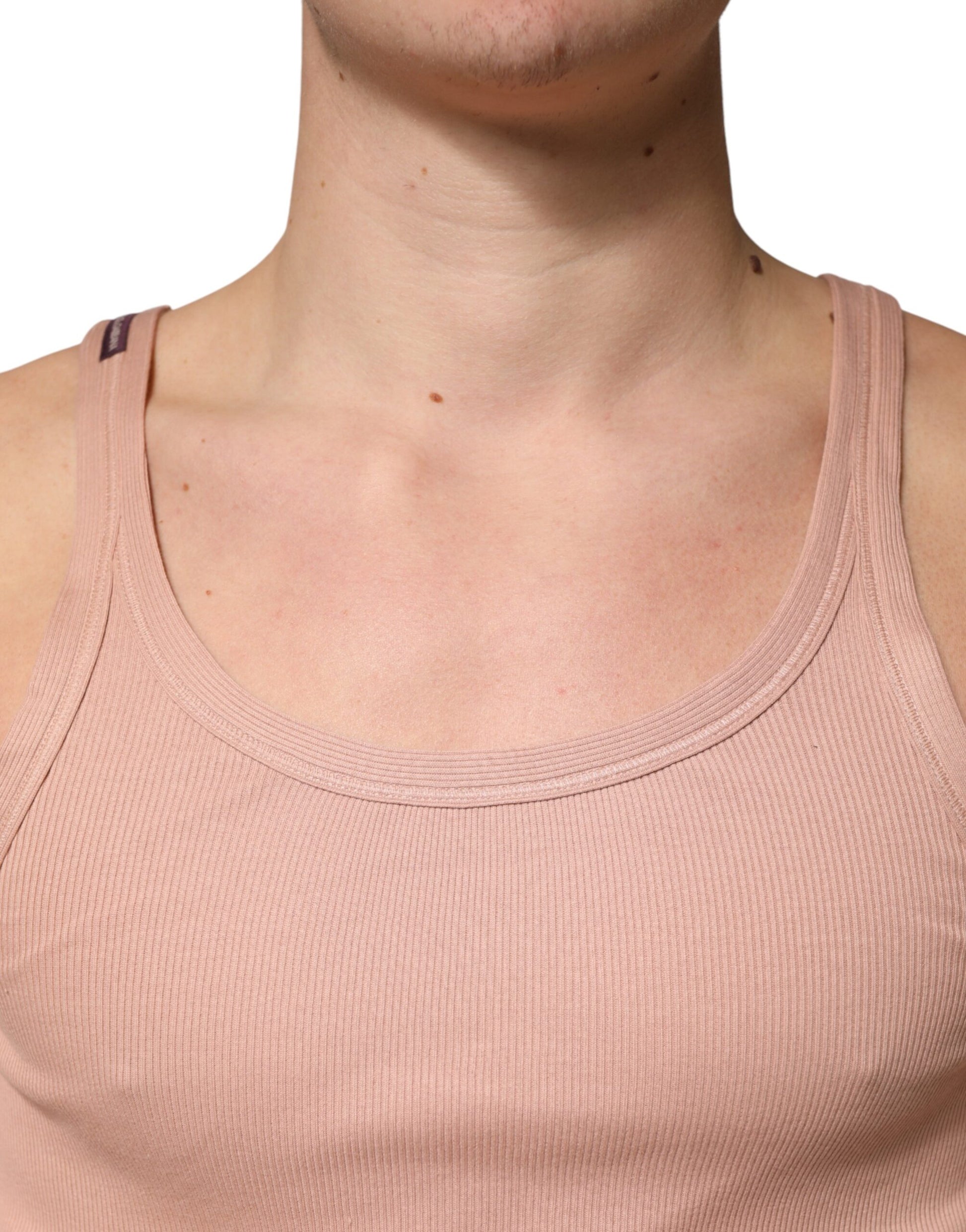 Man wearing pink tank top