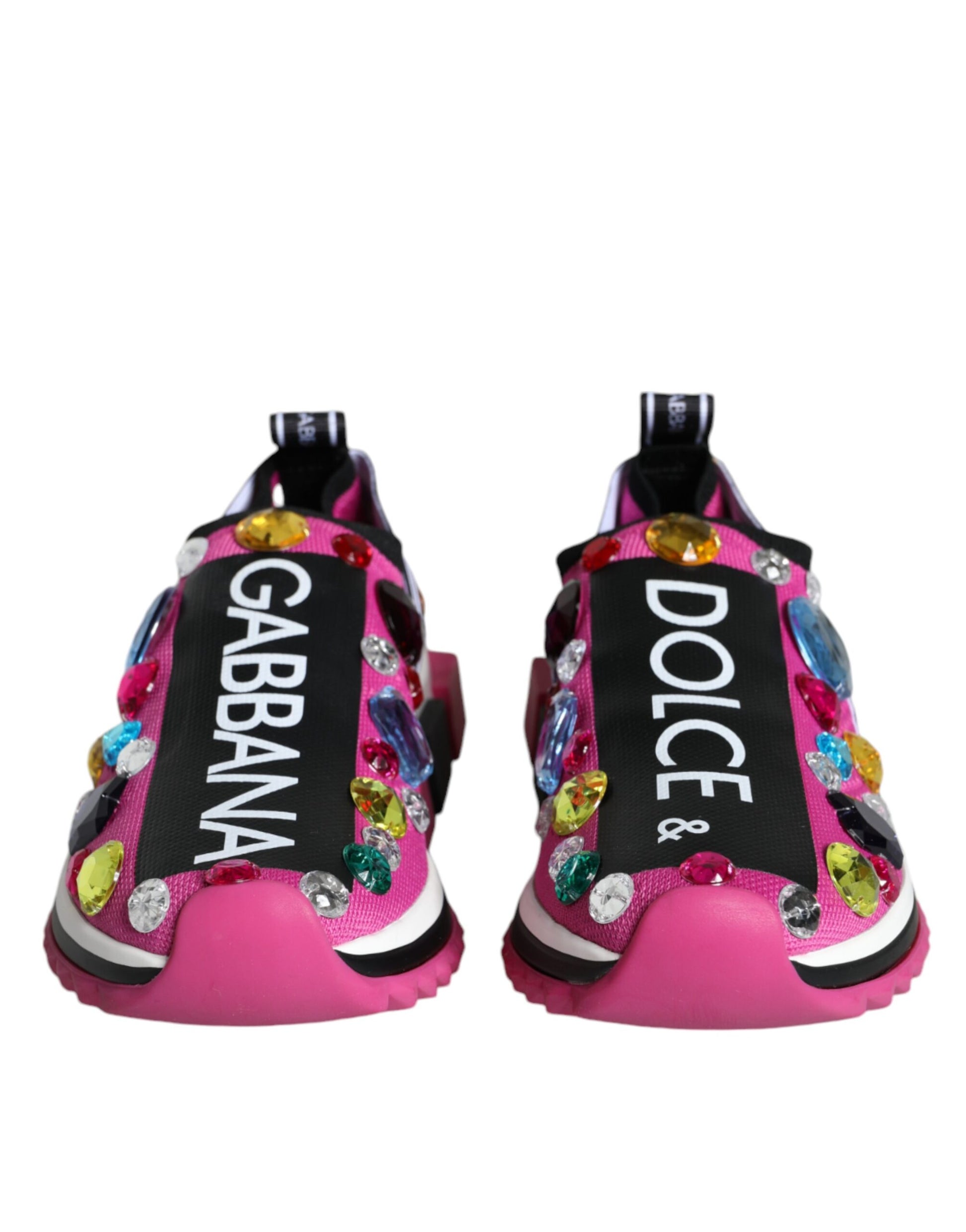 Pair of pink sneakers with crystal embellishments and brand name