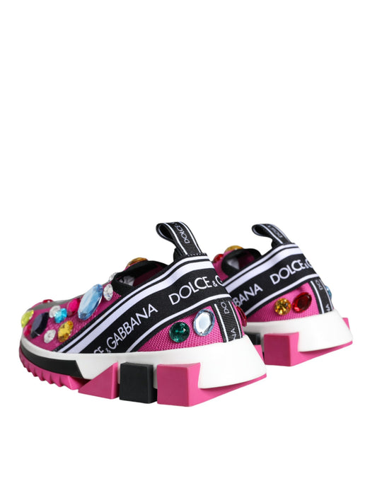 Pair of pink and black baby shoes with crystal embellishments
