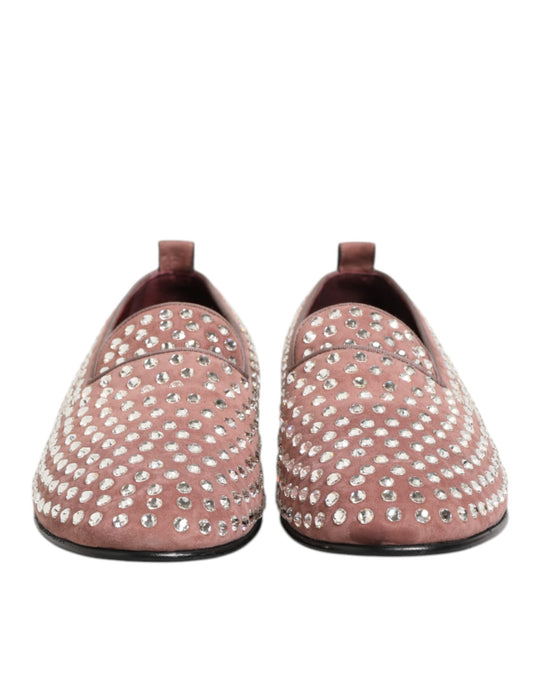 A pair of men's dress shoes with pink suede and crystal embellishments