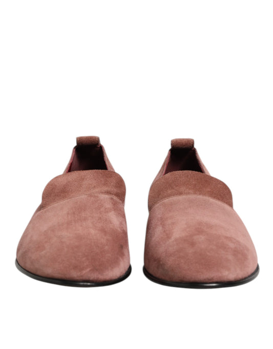 A pair of brown suede loafers with black soles, designed for formal men's dress shoes