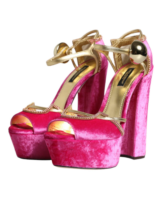 Pink high heel shoes with gold accents