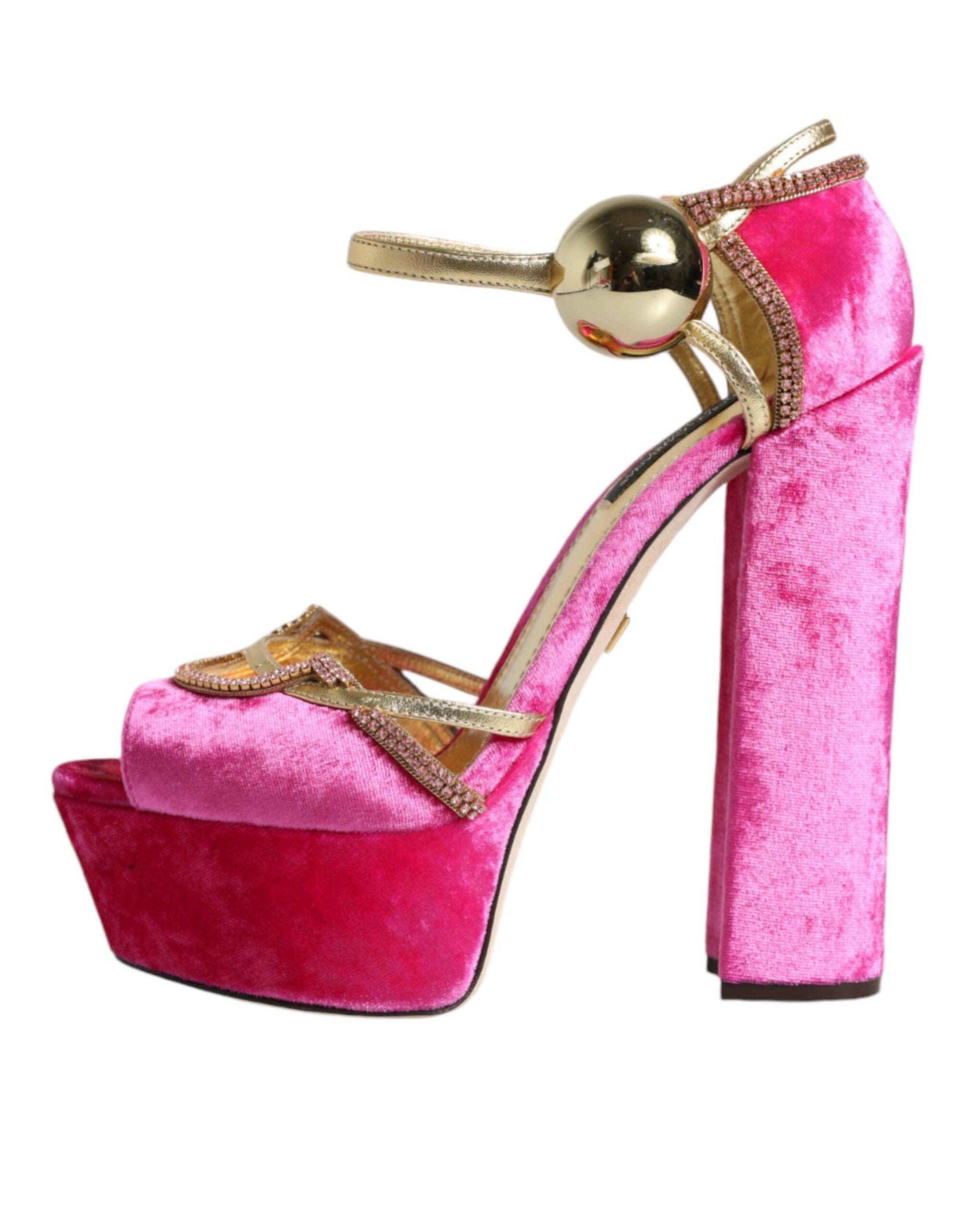 Pink high heel shoe with gold accents