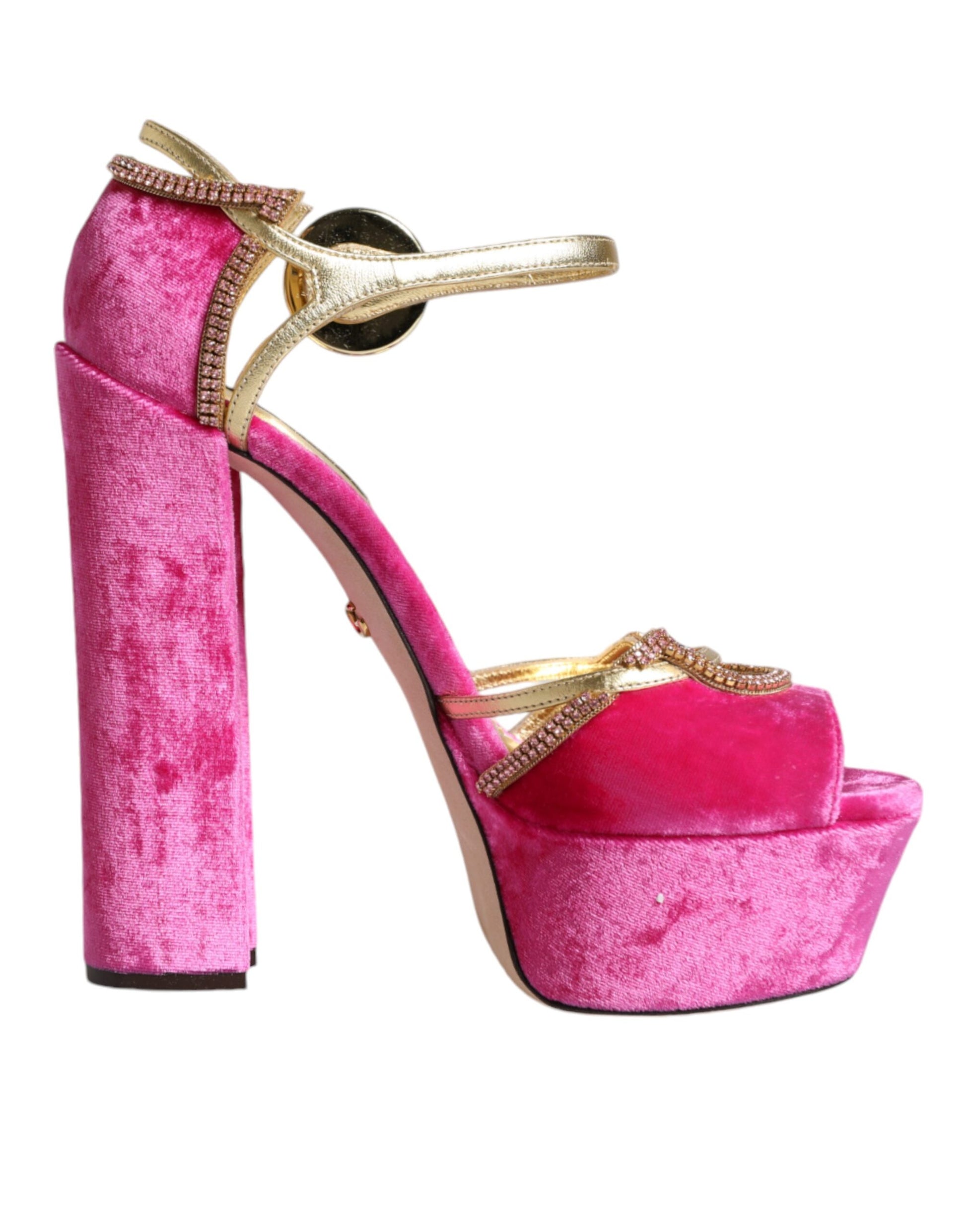 Pink high heel shoe with gold accents