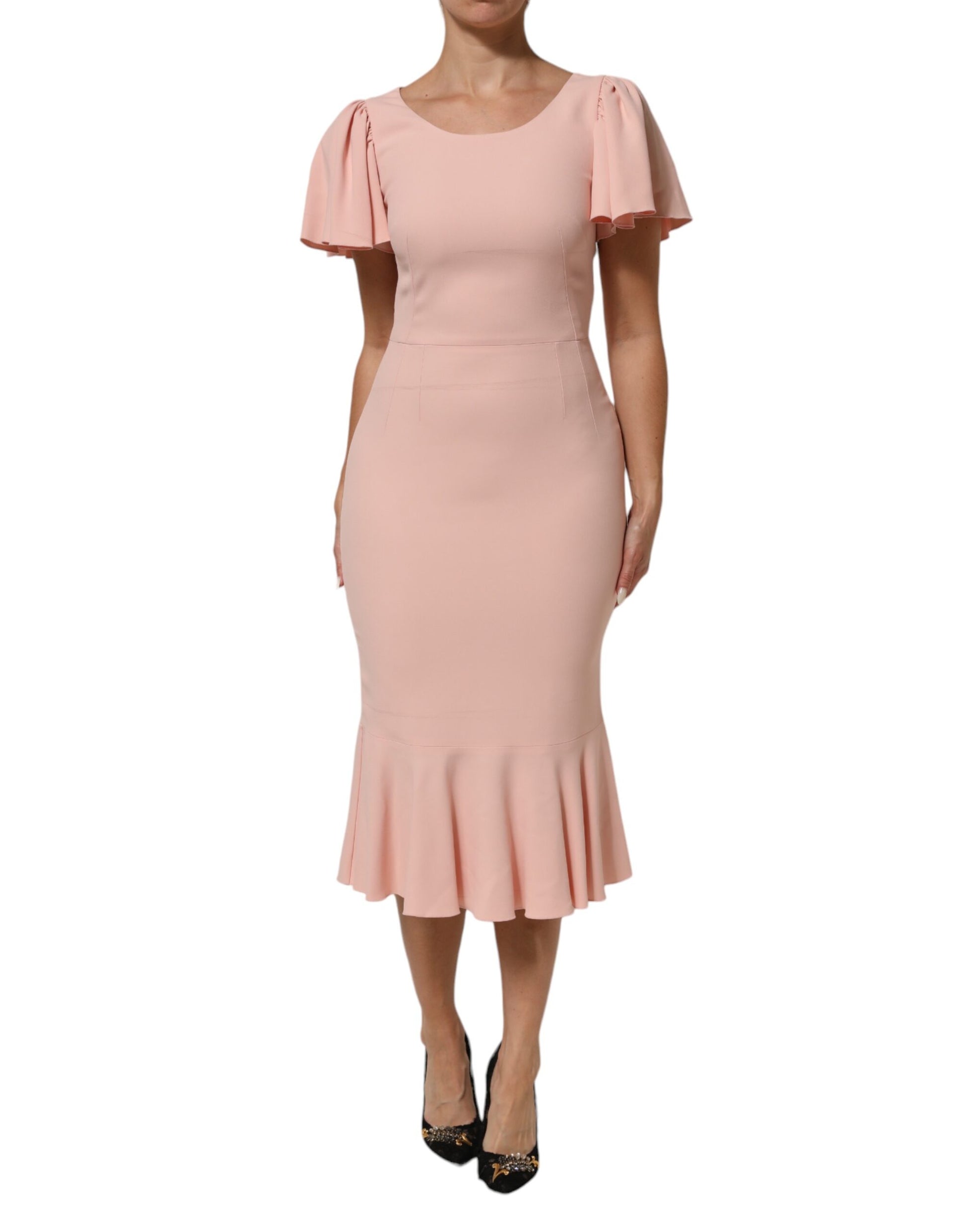 Pink dress with ruffles on sleeves and hem