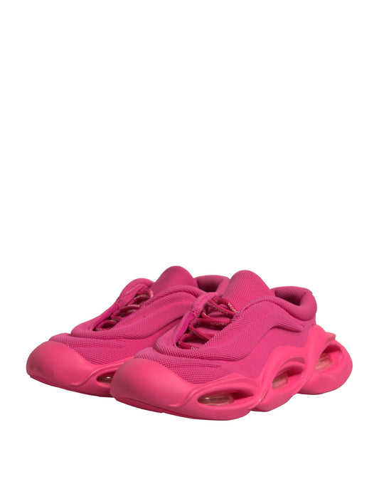 Pink athletic shoes with white soles