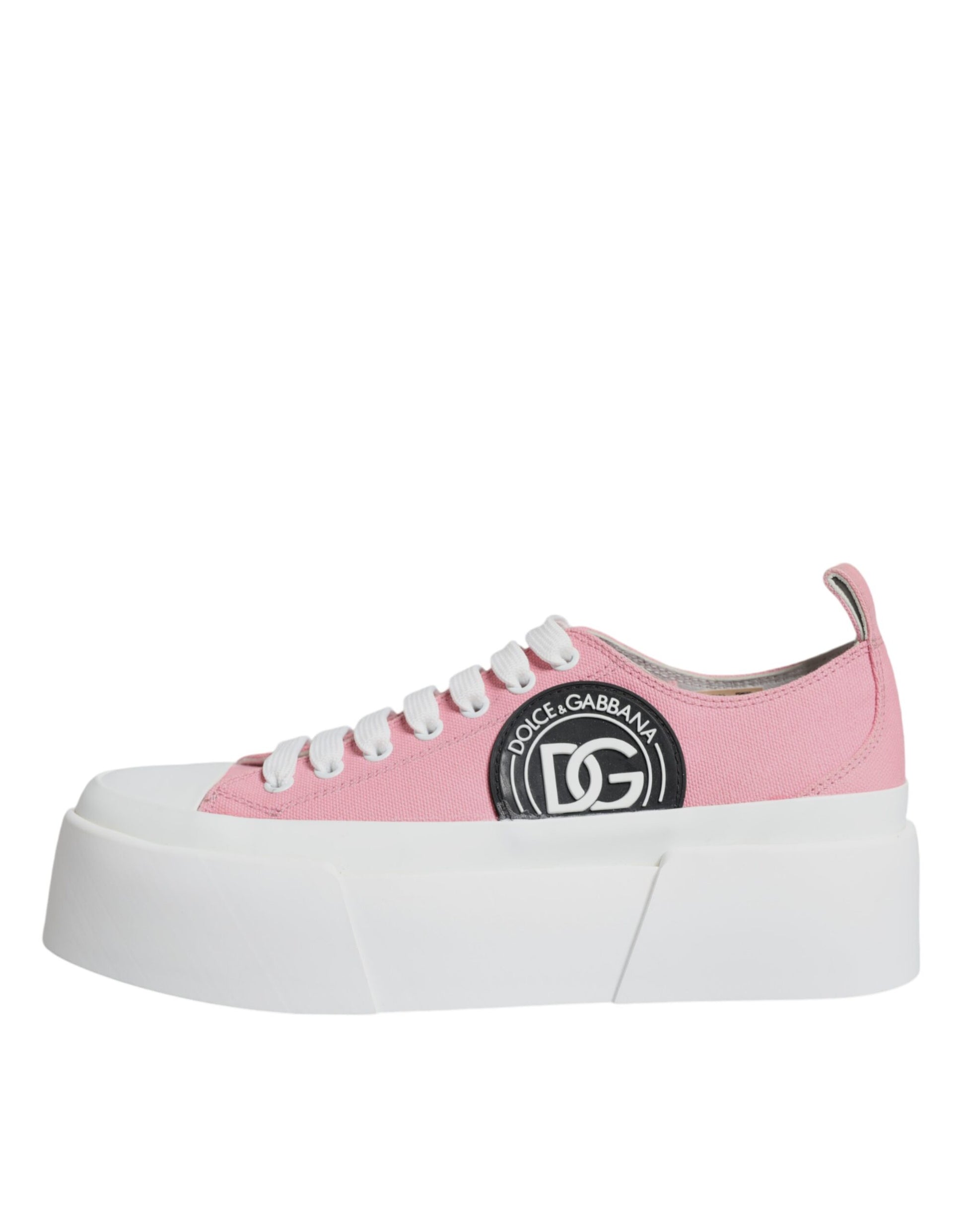 Pink and white canvas sneakers with logo on side