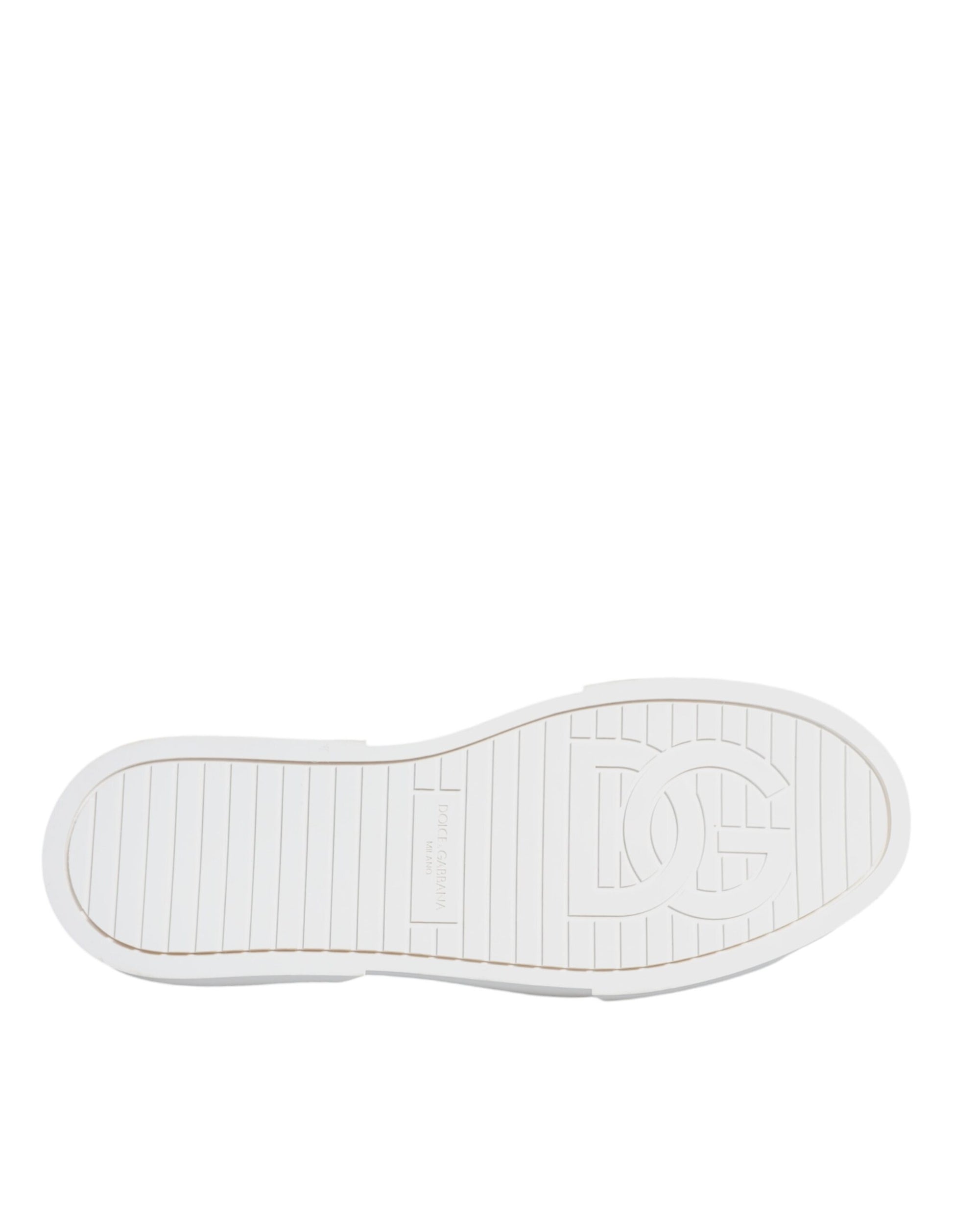 A pair of white and pink canvas shoes with a logo on the side
