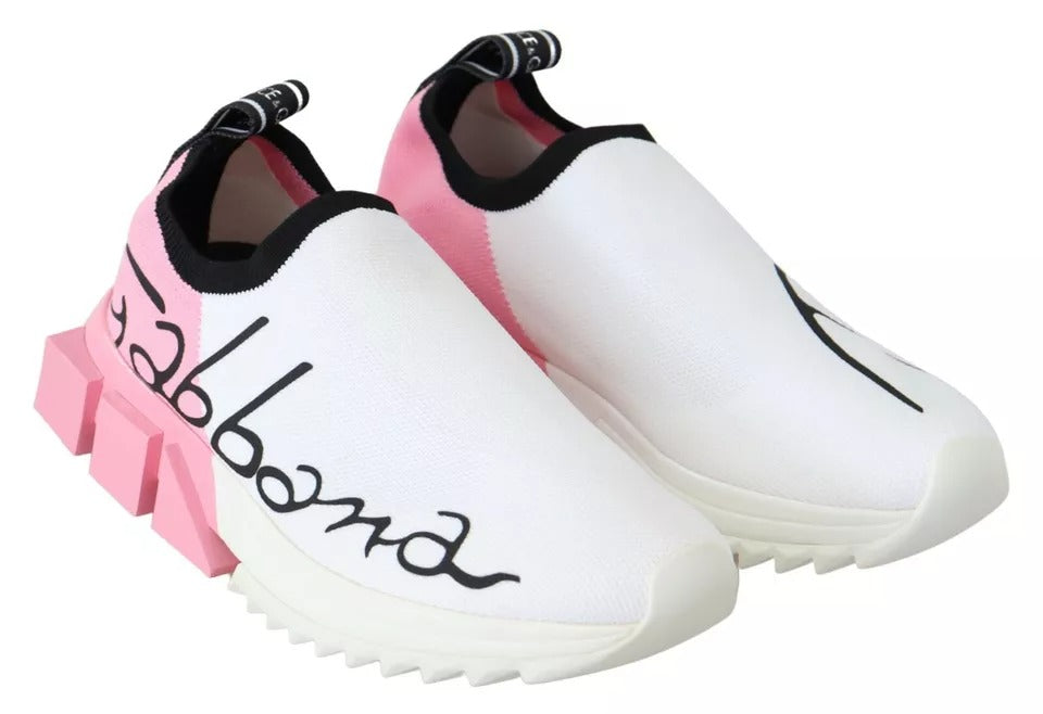 Pair of white sneakers with pink accents and black lettering on side