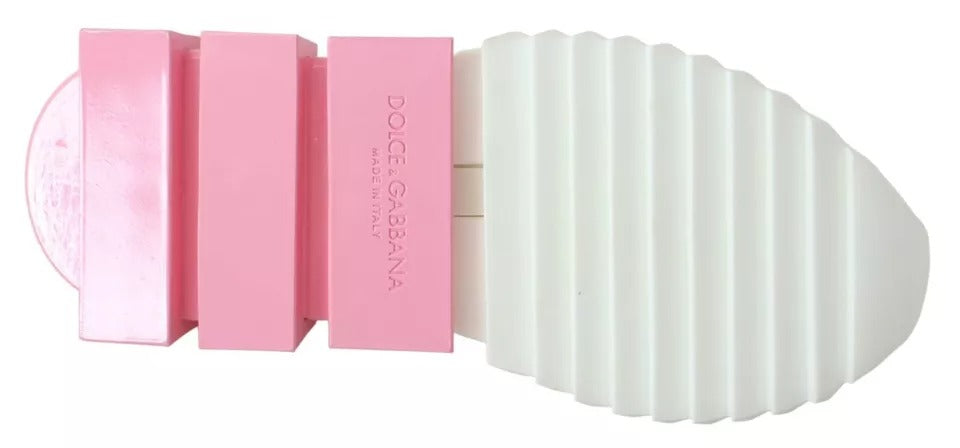 Pink and white foot scrubber with bristles