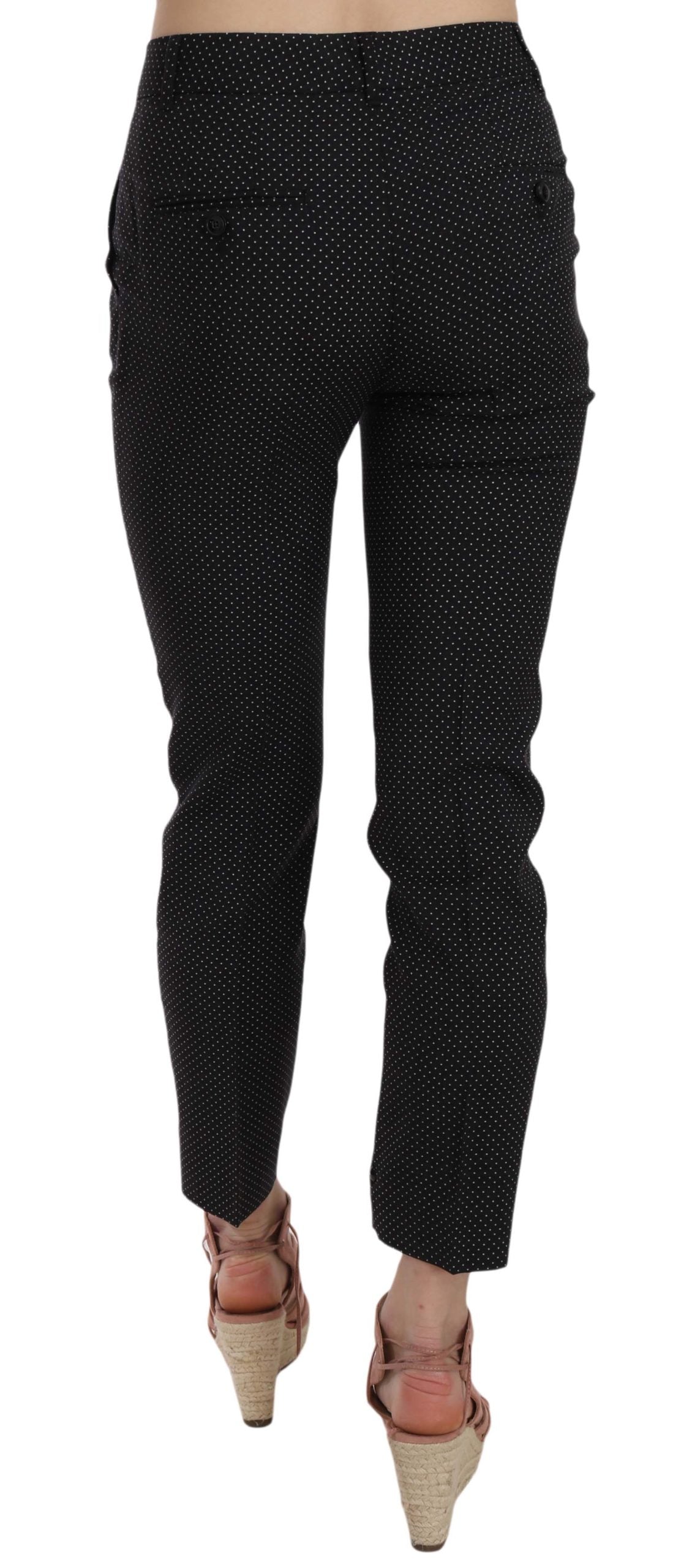 Pair of black pants with white polka dots