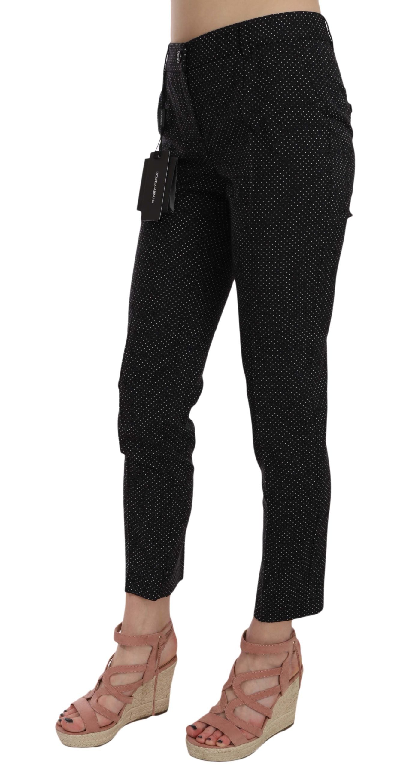 Pair of black pants with white polka dots