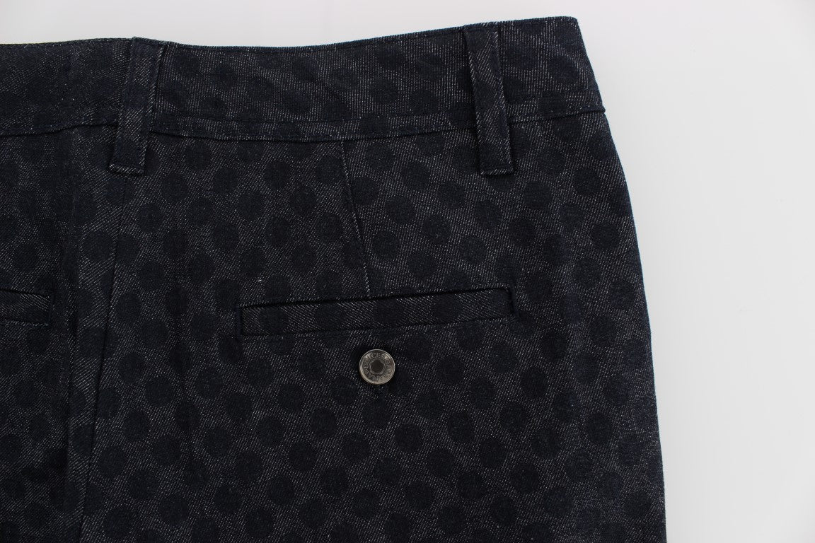 Pair of dark blue men's trousers with buttoned pockets and a single button at the waist