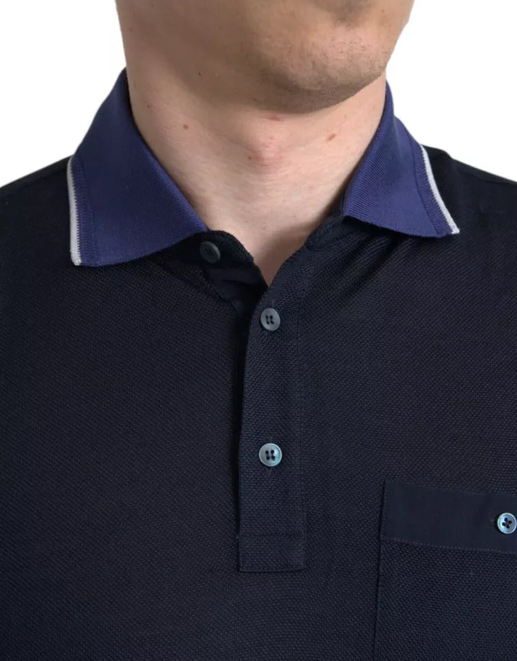 The shirt is blue with white stripes on the collar and sleeves