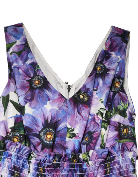 A midi dress with a purple anemone print and pleats, designed by Dolce & Gabbana
