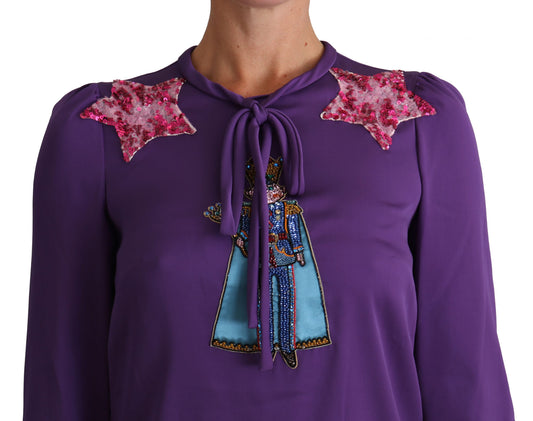 Purple embroidered blouse with pink stars on shoulders