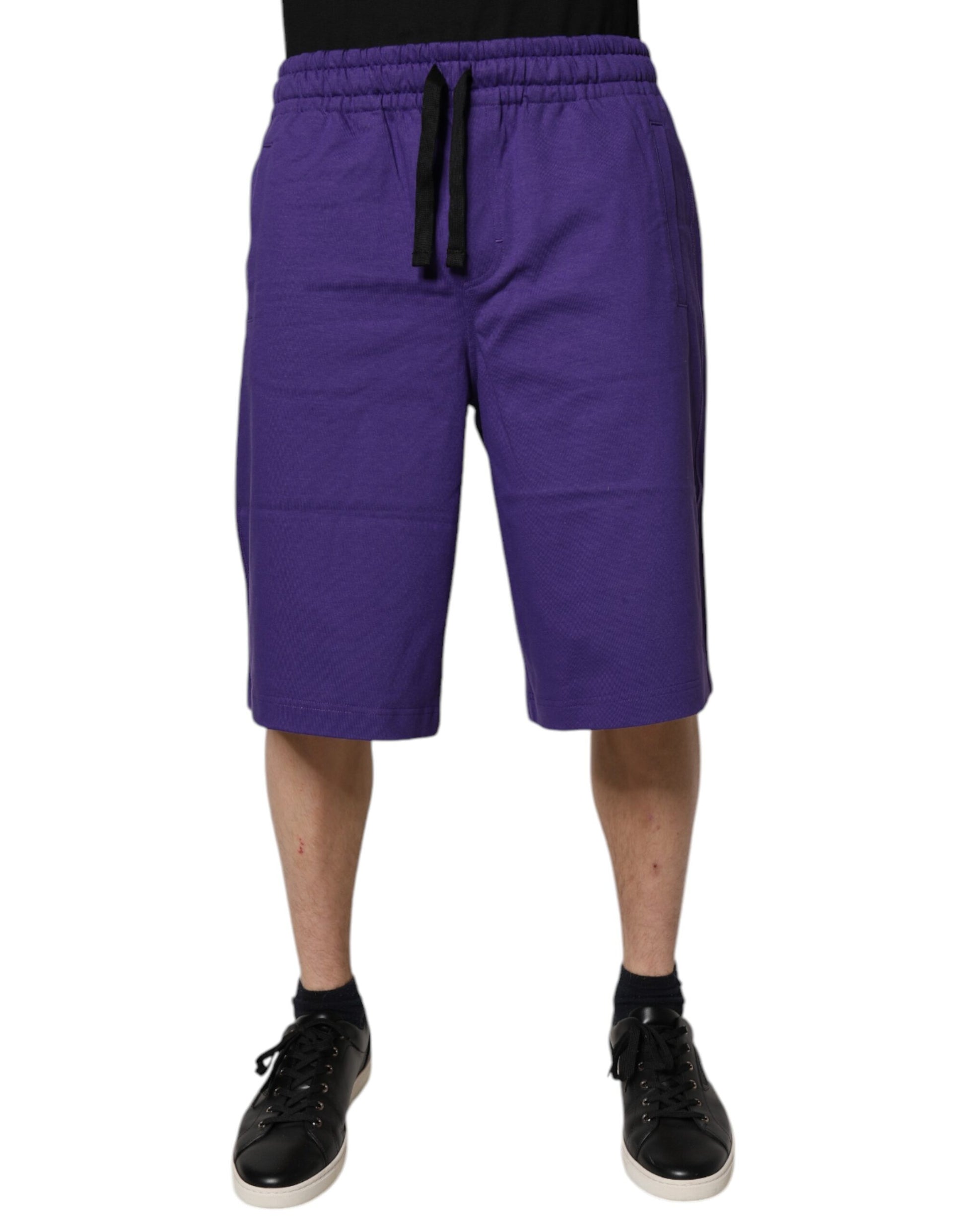 A pair of purple cotton men's bermuda shorts