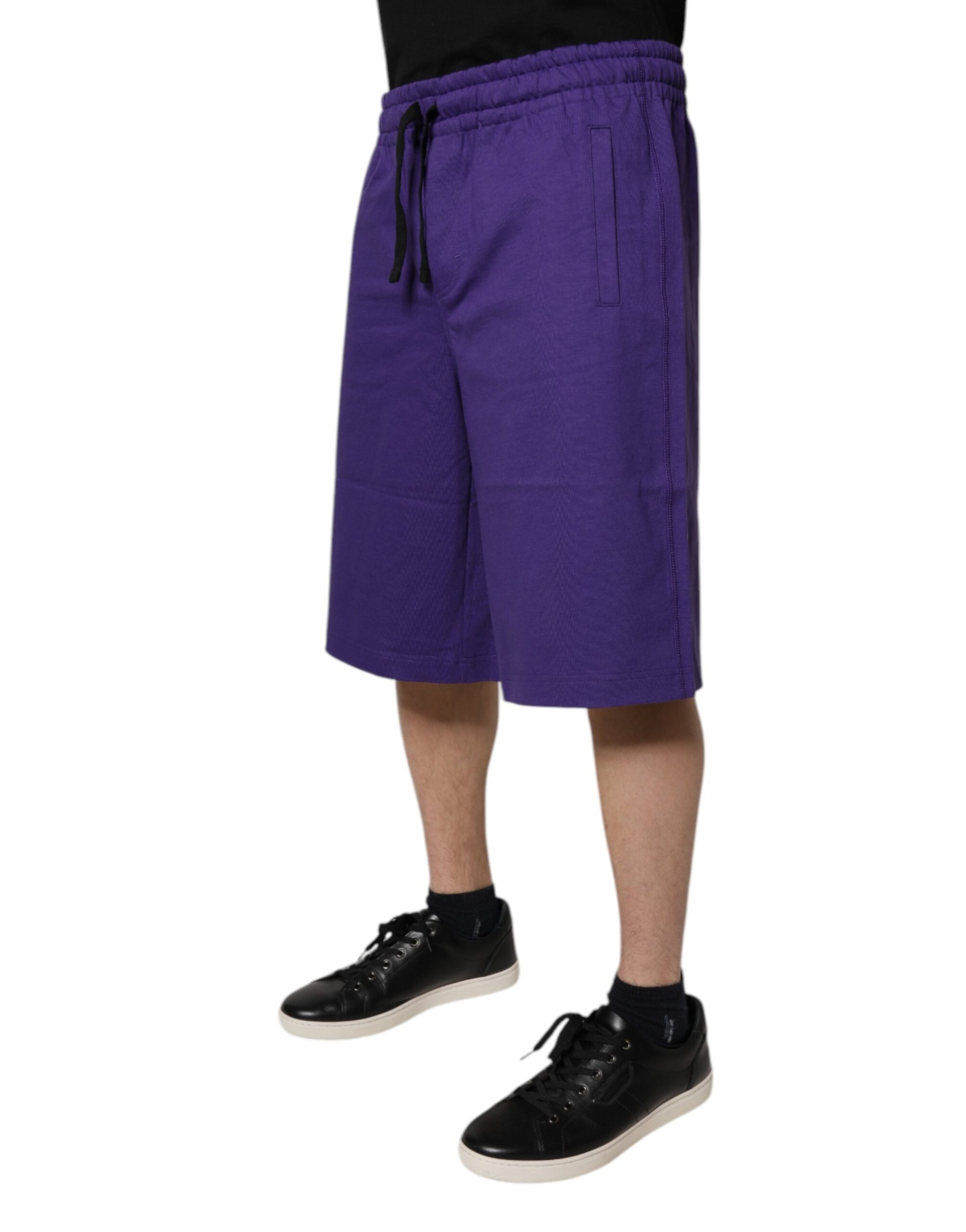 A pair of purple cotton men's bermuda shorts
