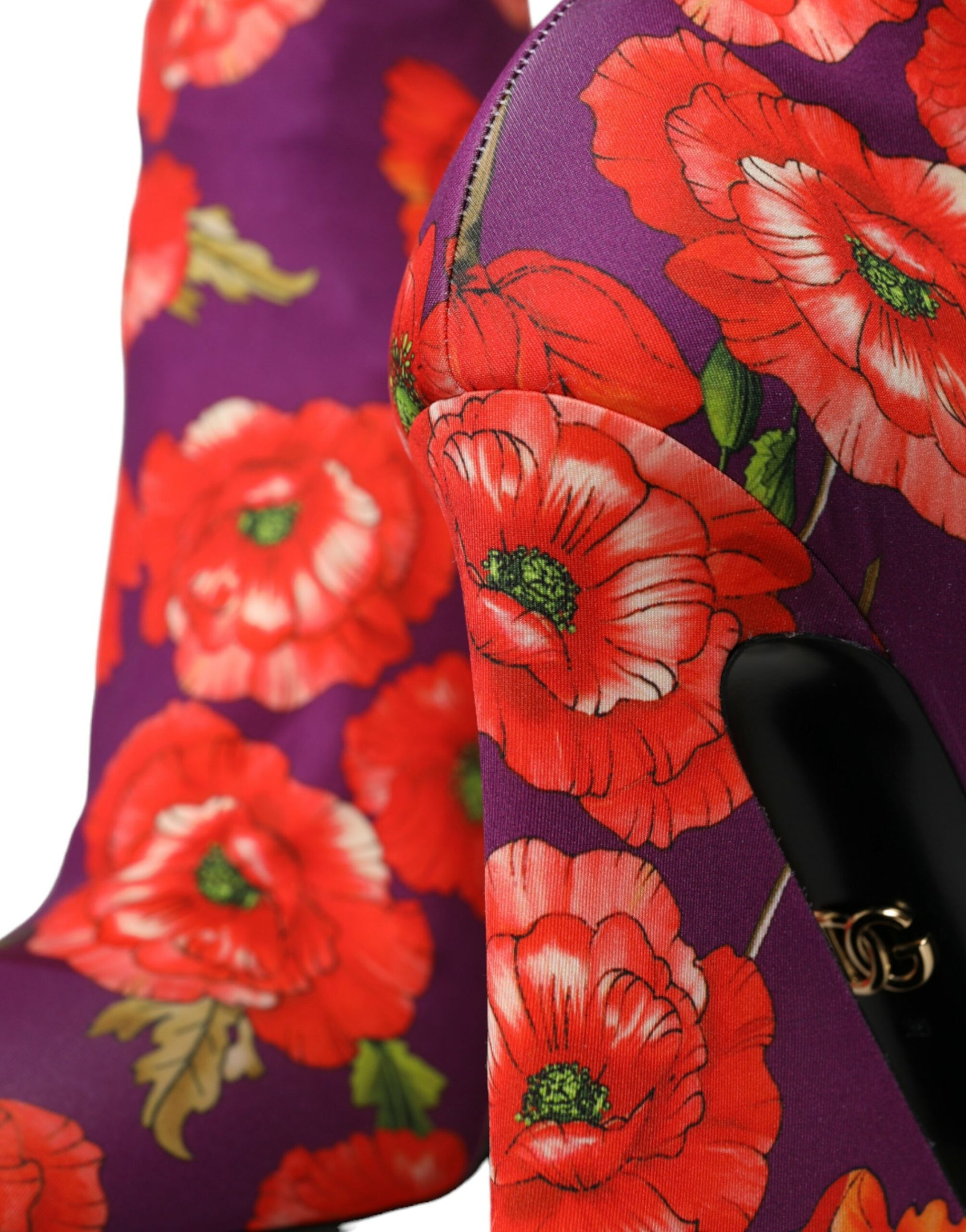Pair of boots with floral pattern on side and top