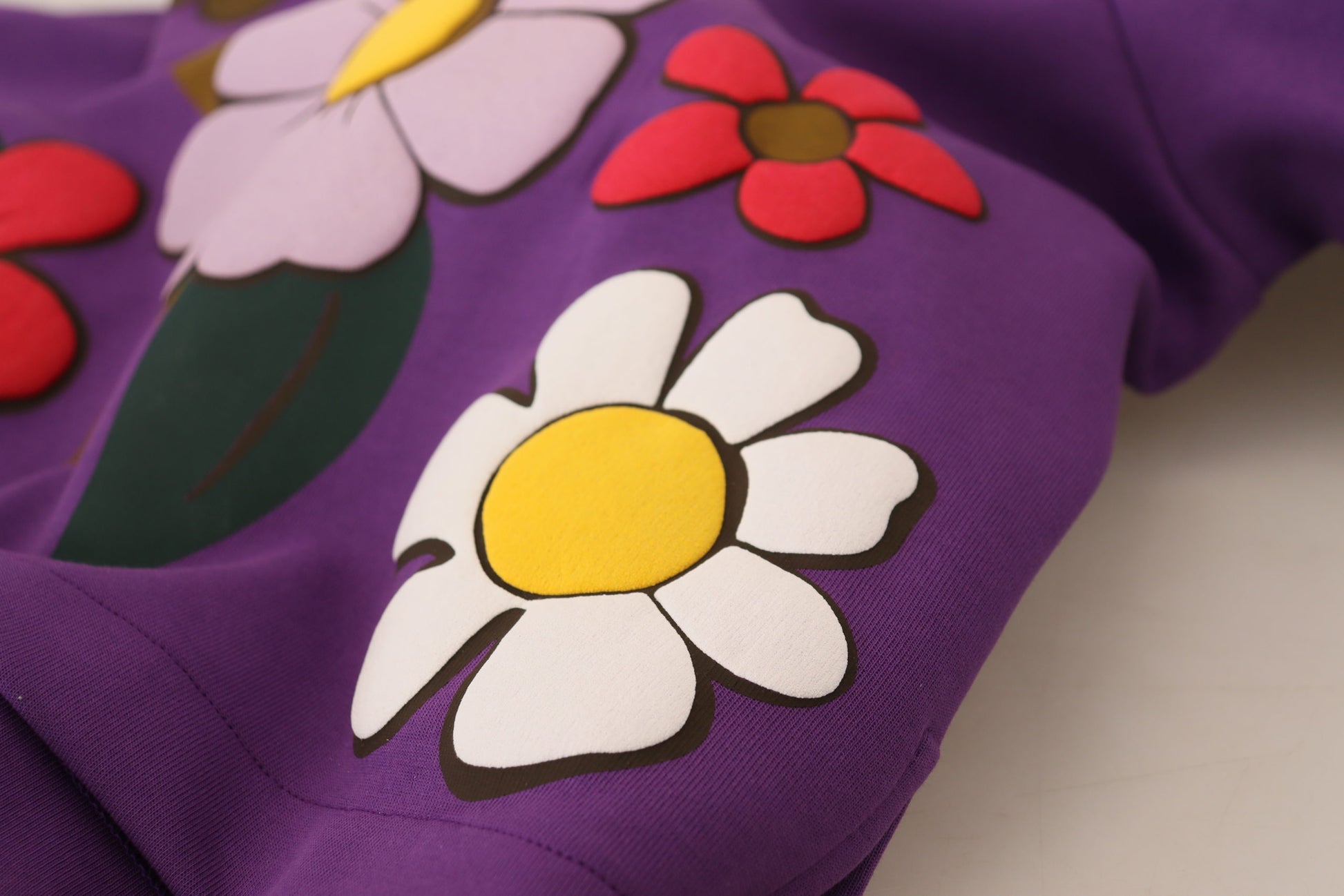 Purple fabric with flower embroidery
