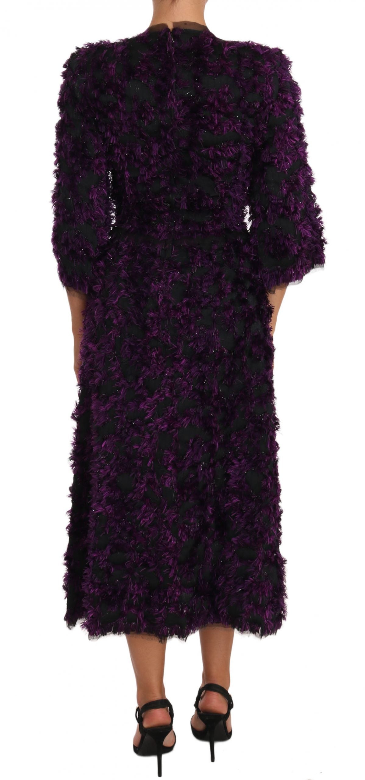 A purple midi dress with fringe details, designed by Dolce & Gabbana