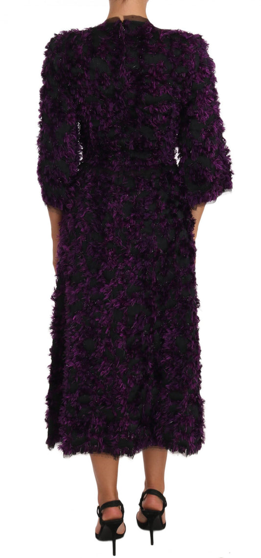 A purple midi dress with fringe details, designed by Dolce & Gabbana