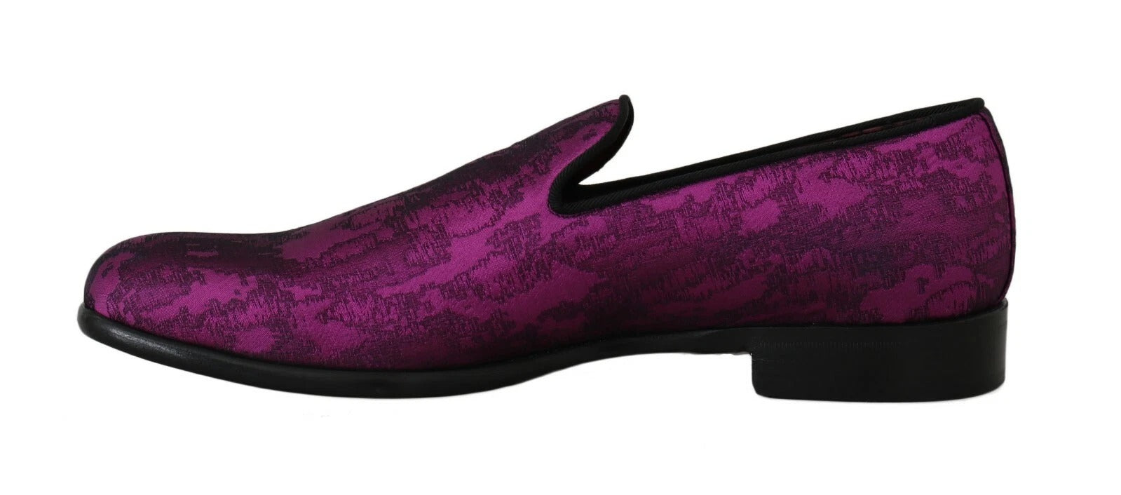 Pair of purple velvet shoes with high heels and a glittery texture