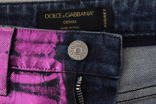 Blue denim jeans with purple patch on waistband