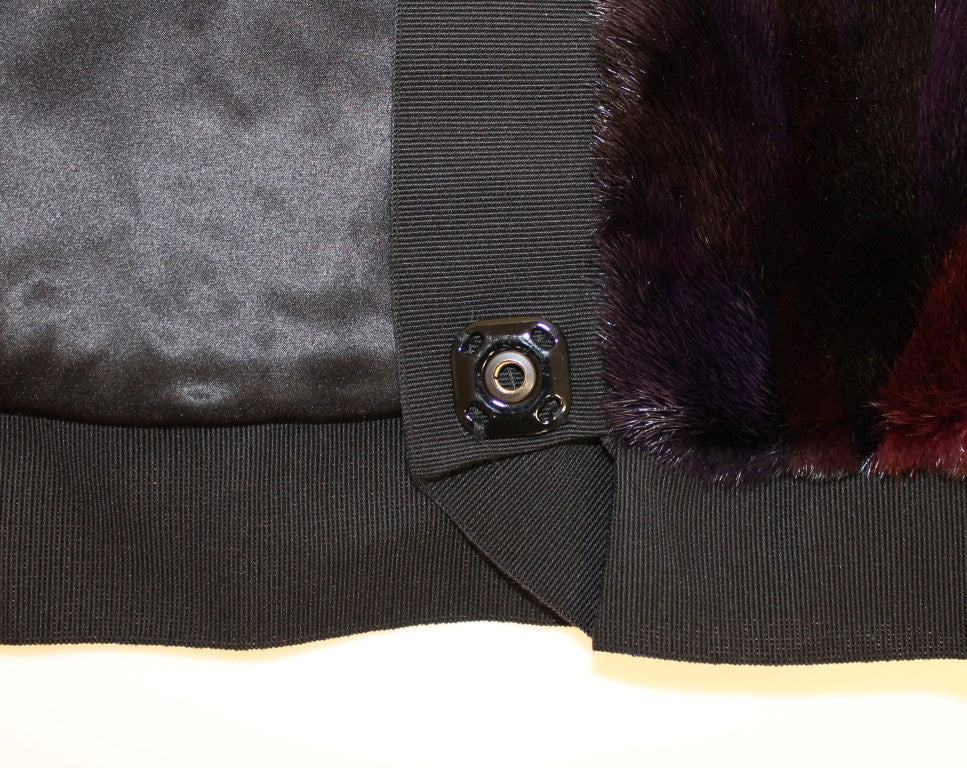 Black fabric with fur trim and buttons