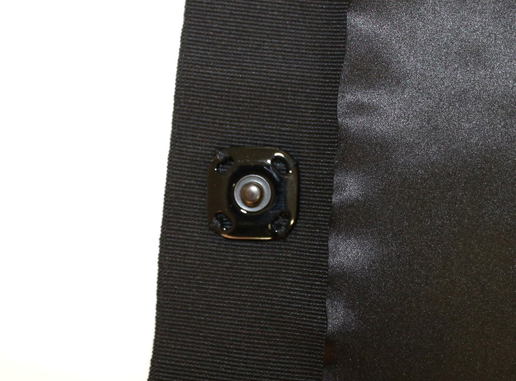 Black camera on black fabric