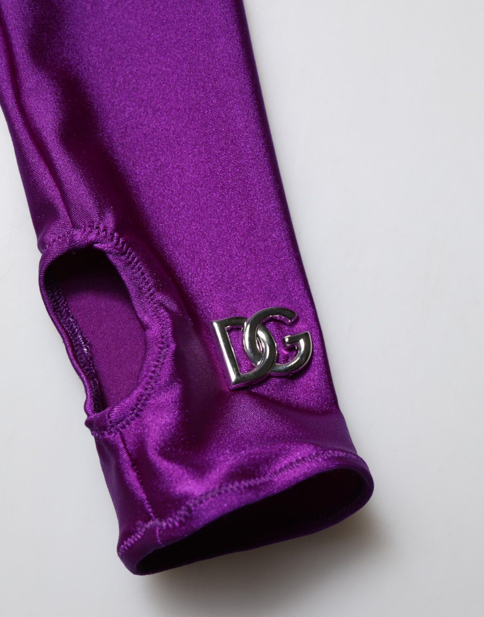 A purple nylon turtleneck bodycon jumpsuit dress