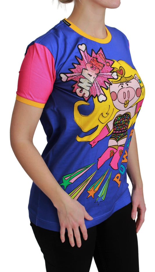 A woman wearing a purple t-shirt with a graphic of a pig superhero