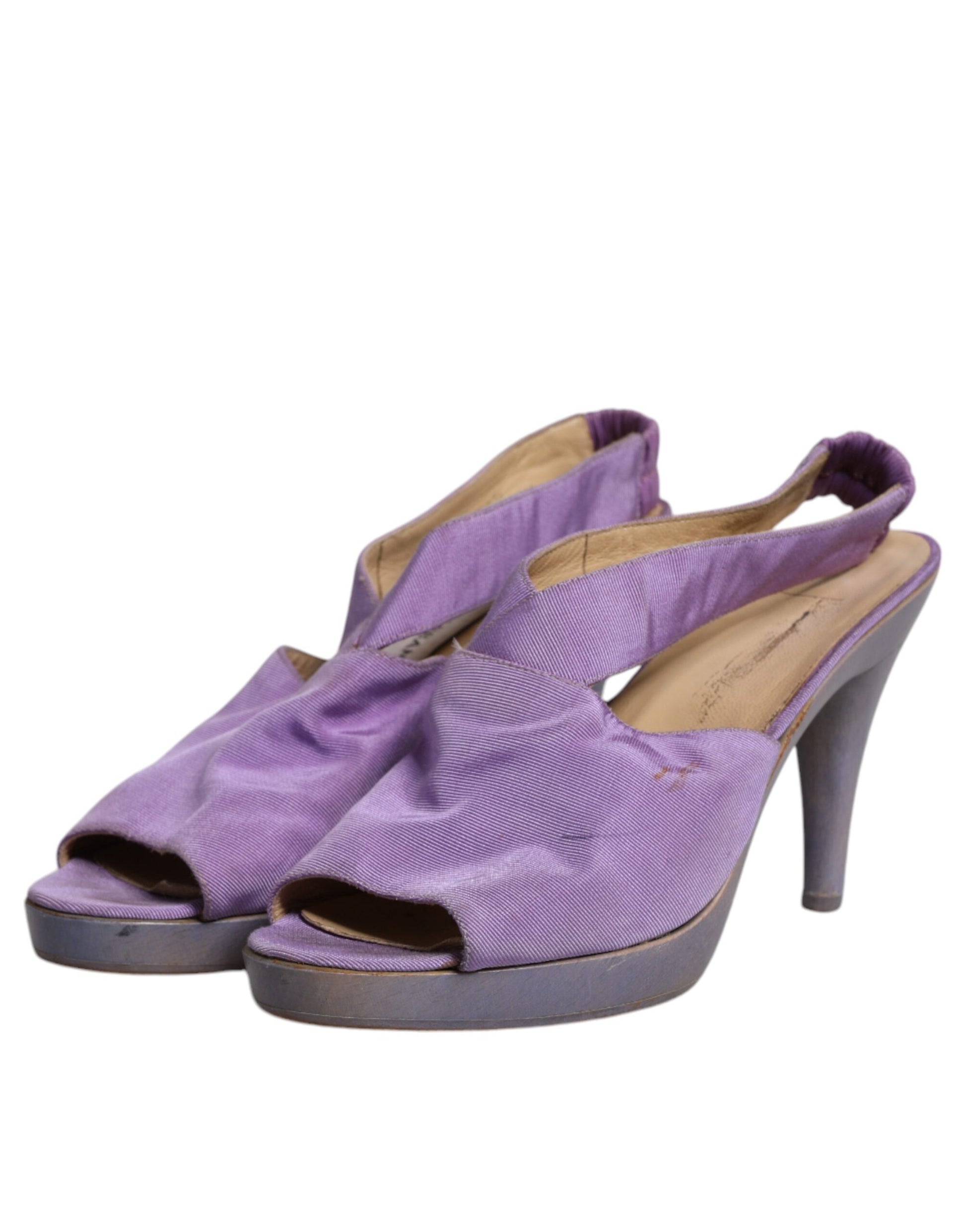 Pair of purple high heel shoes