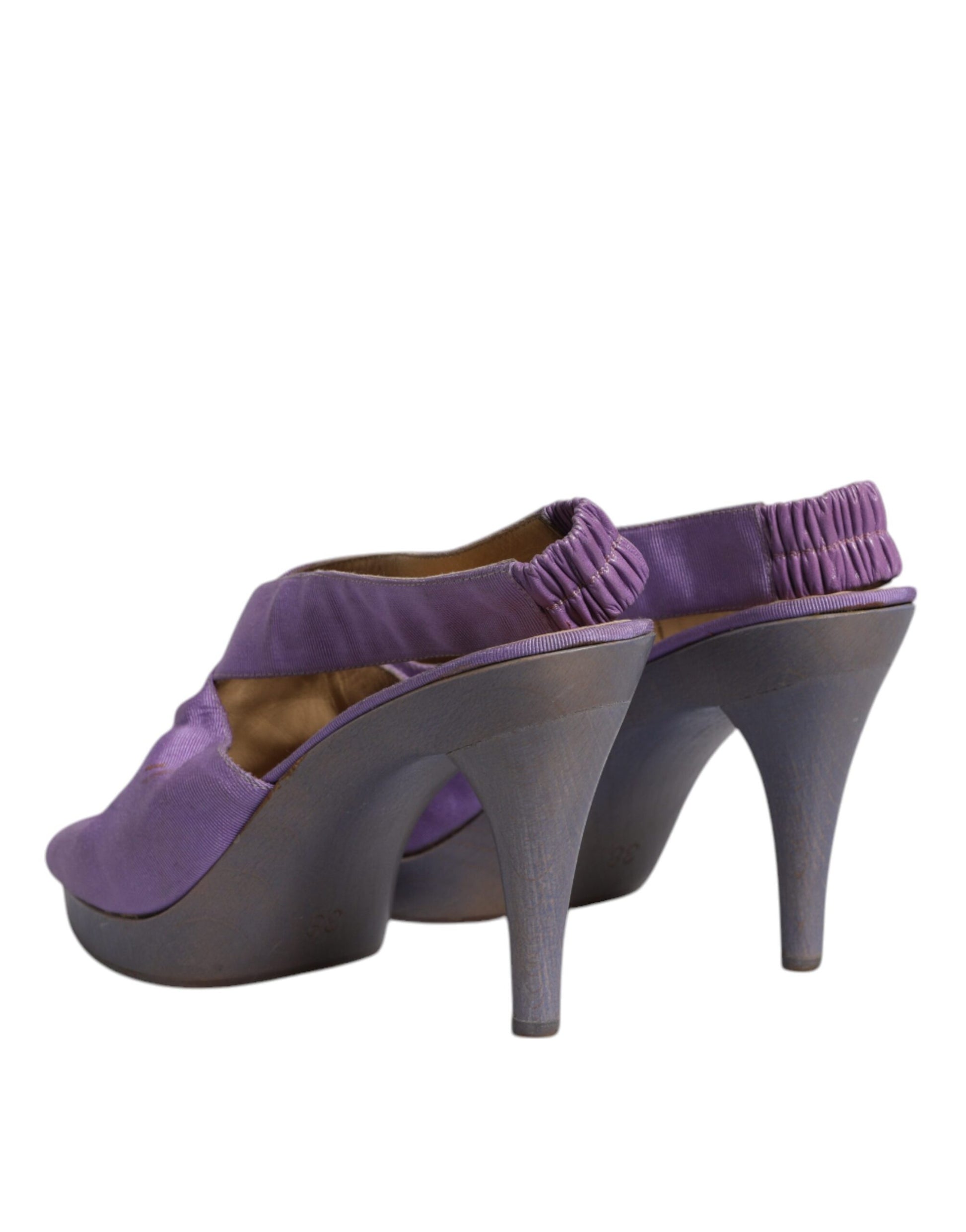 Pair of purple high heel shoes