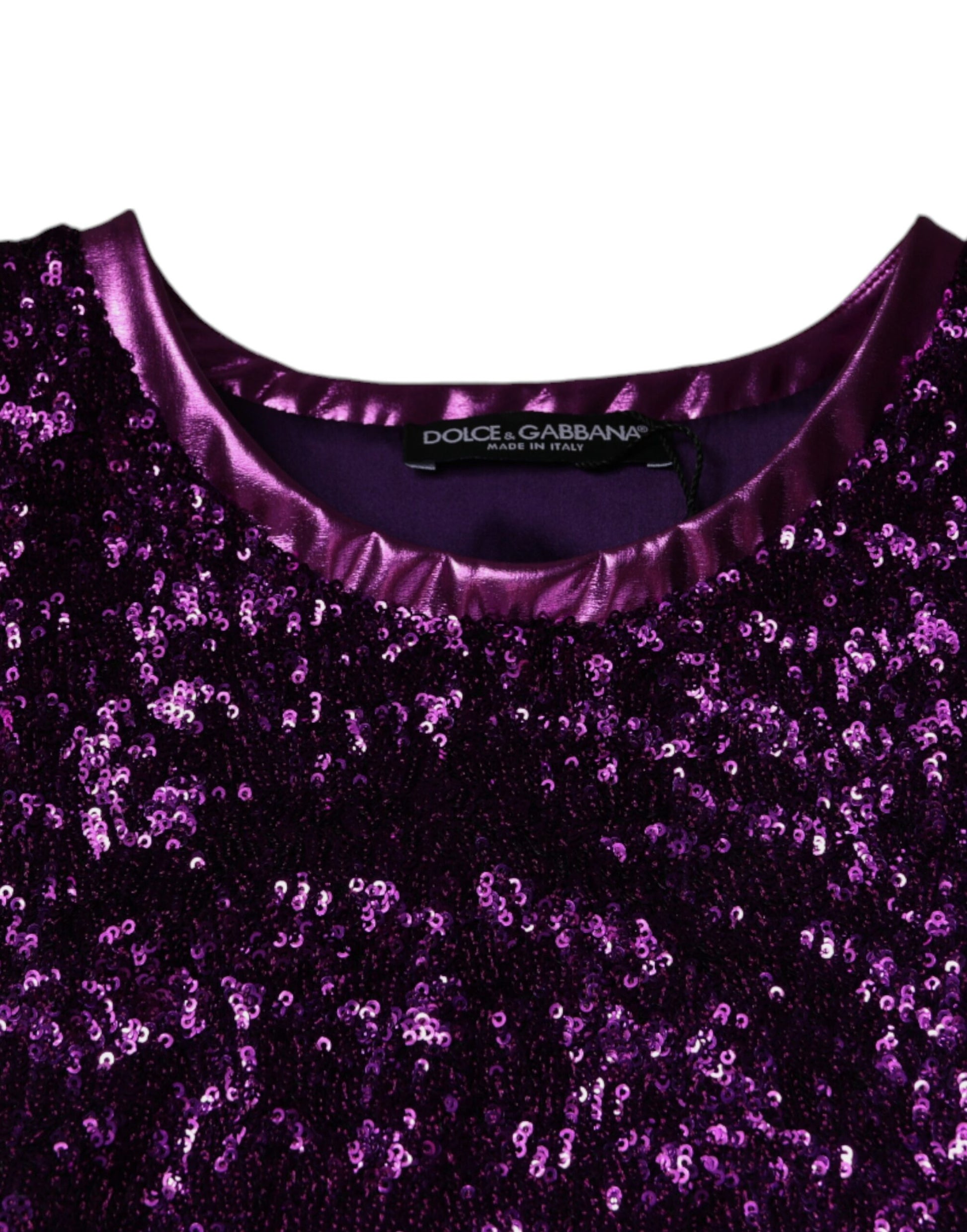Purple sequined dress on hanger