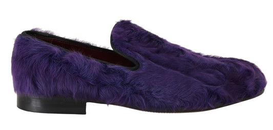 Purple furry loafer shoes with black soles and heels