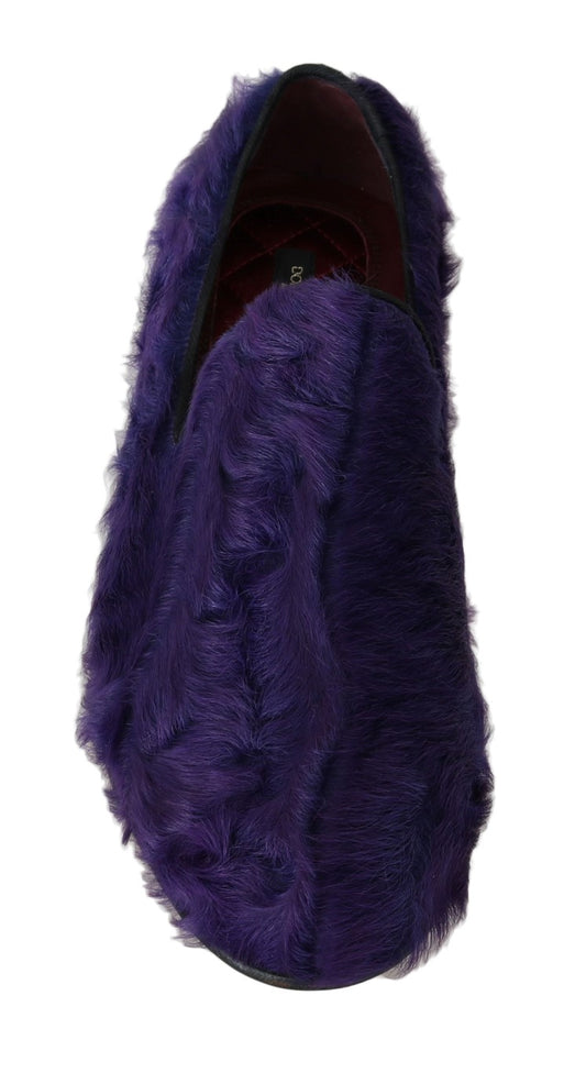 Purple velvet slipper with a furry texture and a red interior