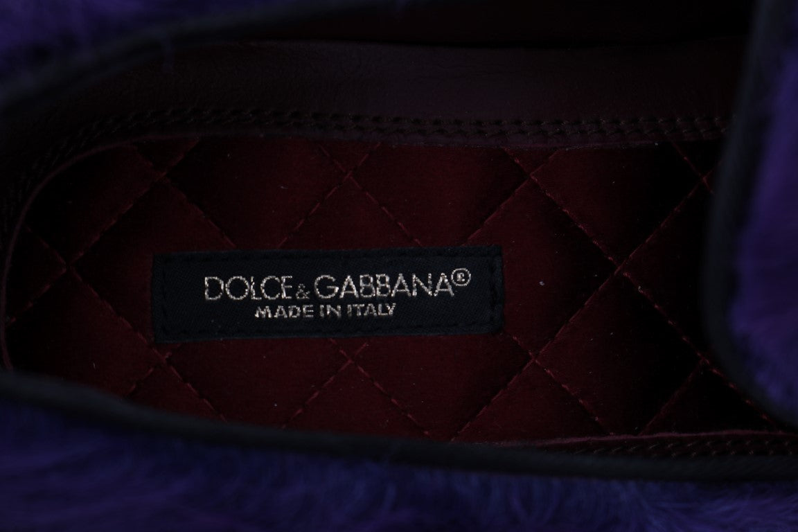 Red velvet interior of a shoe with a label that reads D&G Dolce & Gabbana Made in Italy