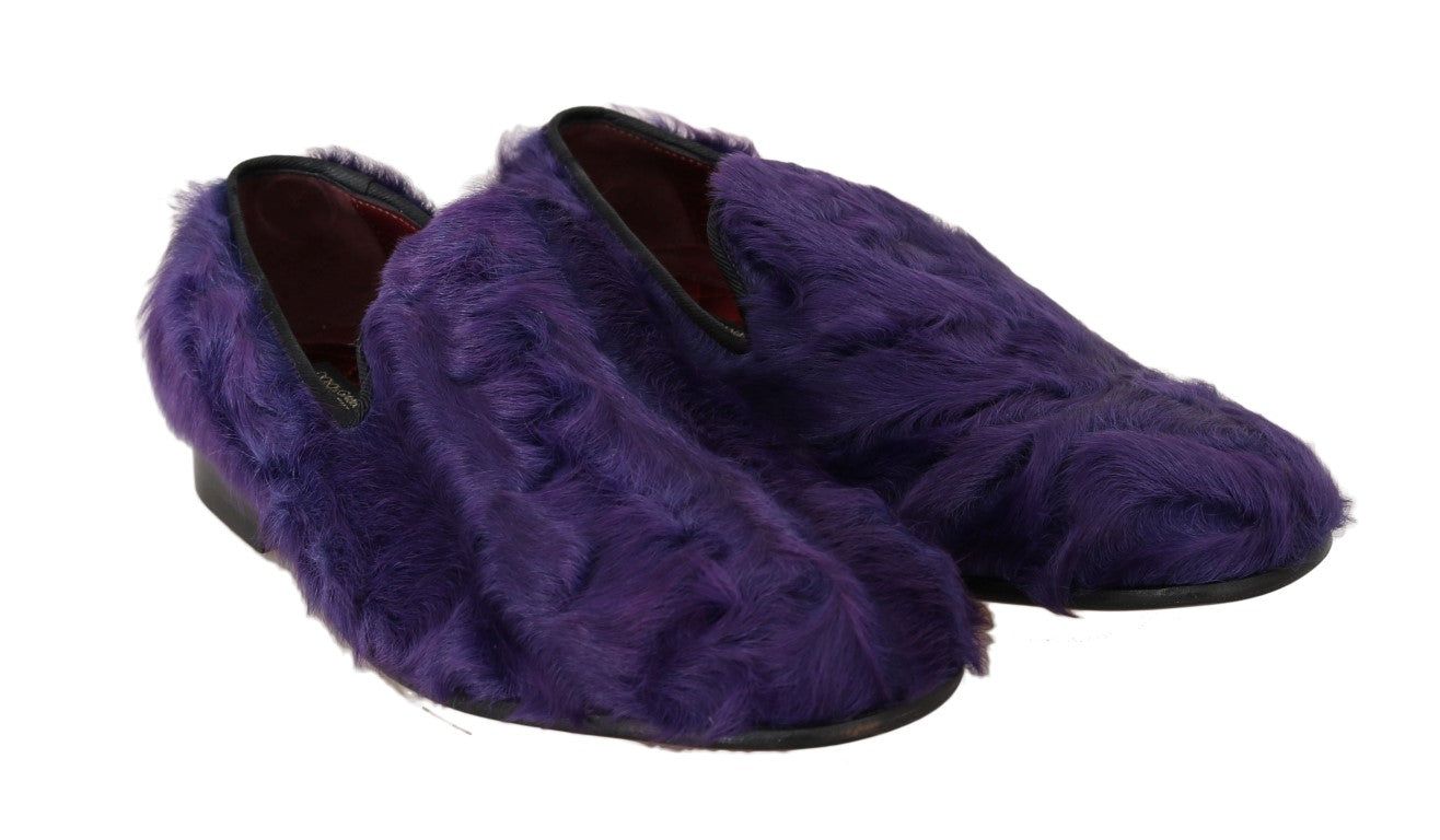 Purple furry slippers with black soles and heels