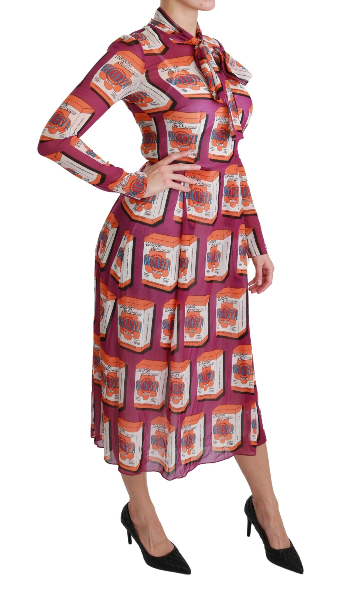 A woman wearing a purple silk dress with a floral pattern. The dress features an A-line cut and is designed b