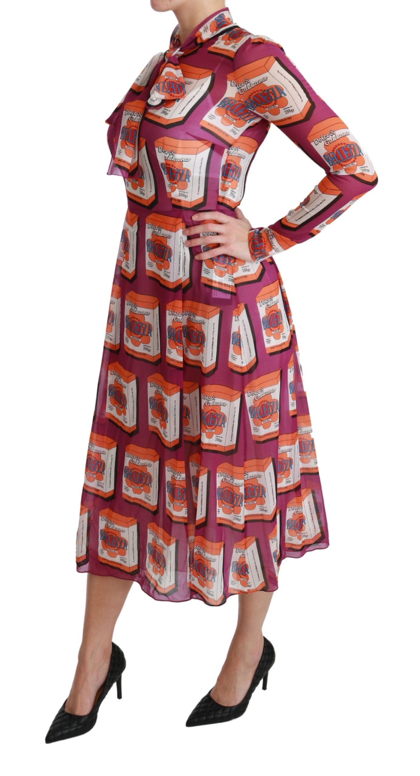 A woman wearing a purple silk dress with a floral pattern. The dress is an A-line style and features a high n