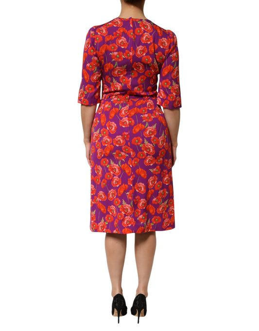 A midi dress with a floral print in shades of purple and red