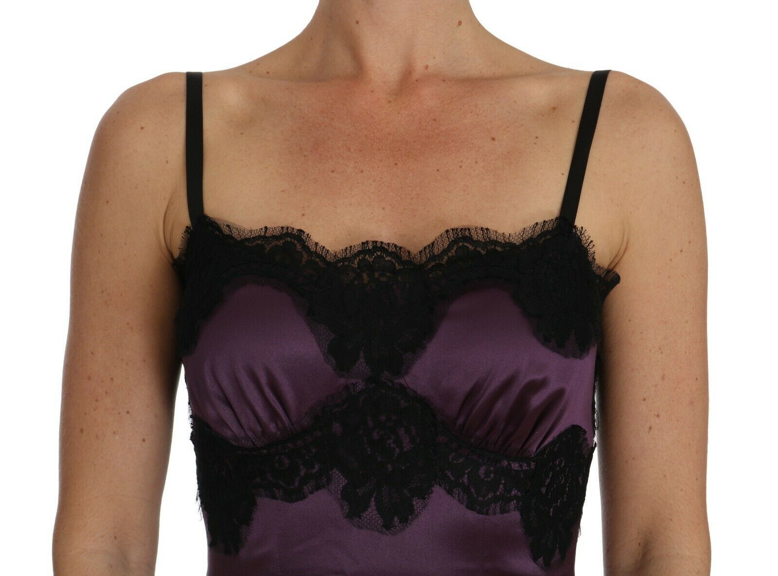 A purple silk stretch dress with black lace detailing. It is an A-line style, which suggests it has a fitted