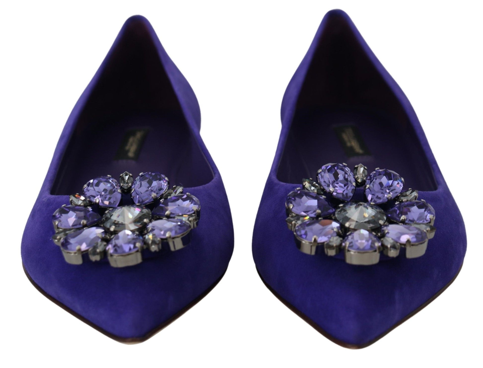 Pair of purple velvet shoes with embellished heels