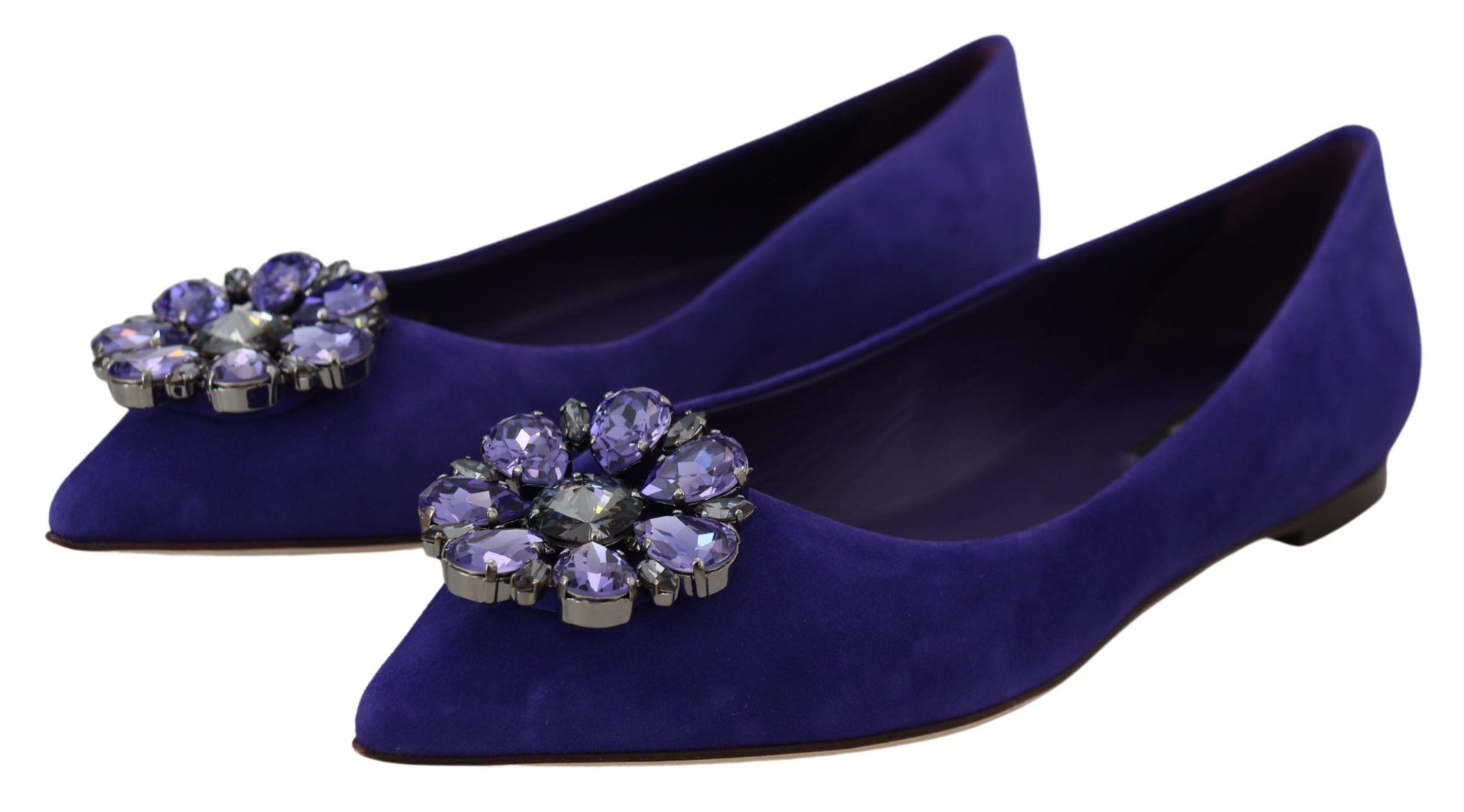 Pair of purple velvet shoes with embellished heels
