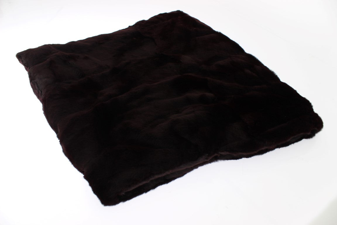 Fuzzy brown fabric on white surface