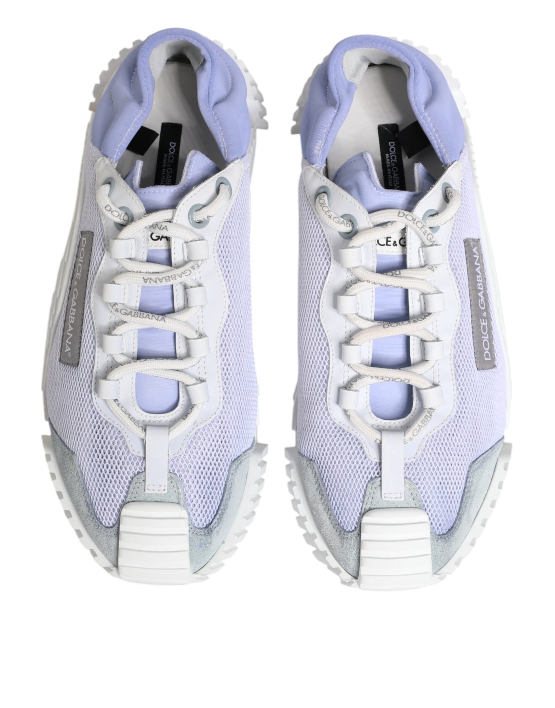 Pair of lace-up sneakers in purple and white with a low top